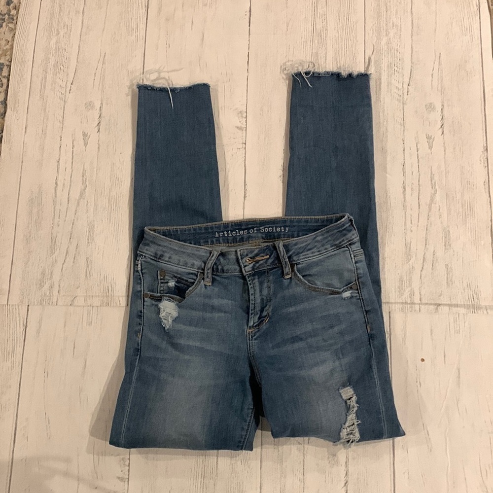 Woman’s Articles of society distressed jeans size 24